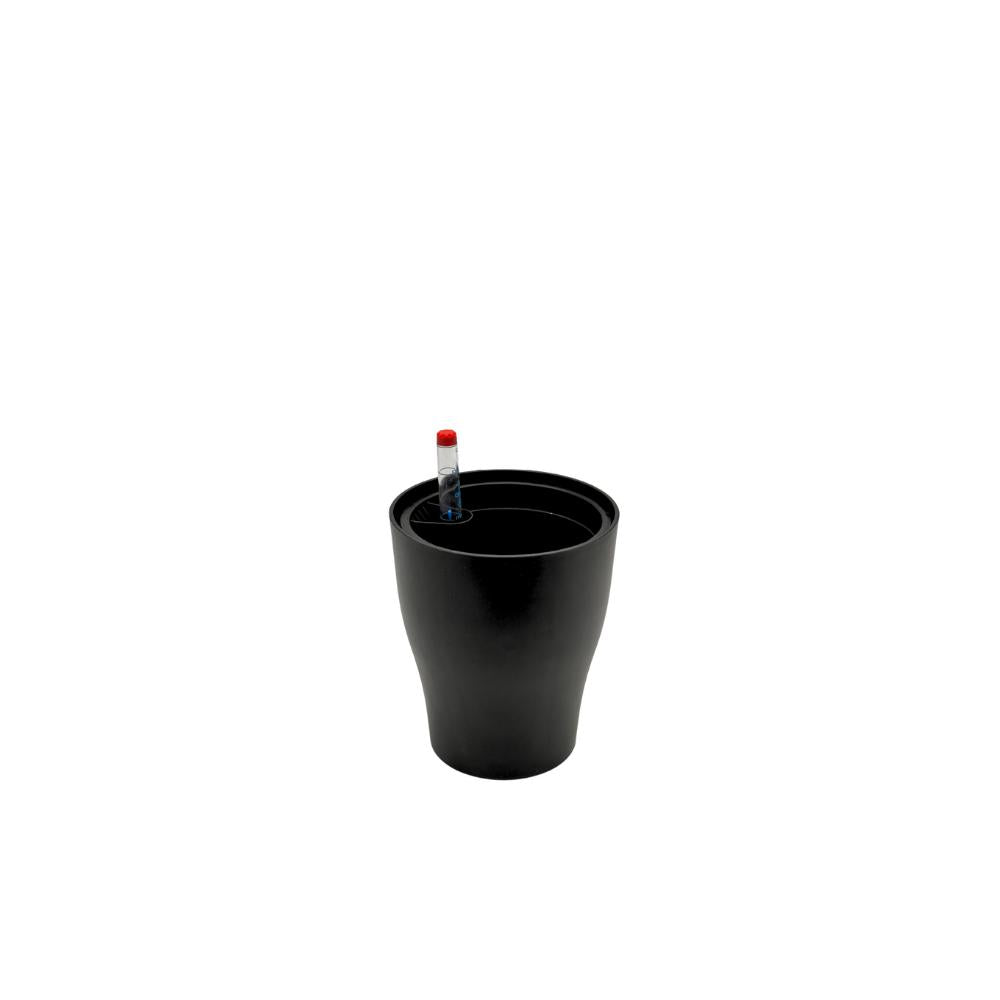 Blue matte indoor planter with green tropical houseplant and water gauge