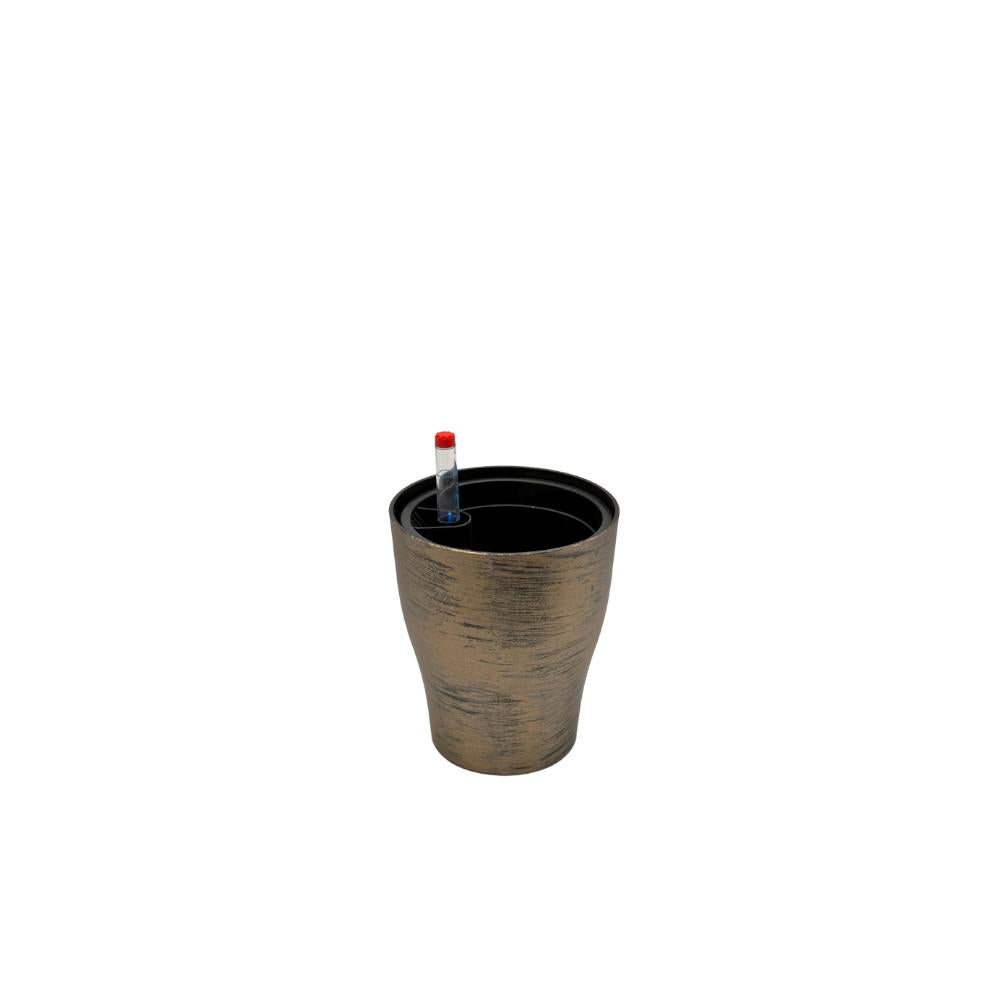 Empty gold self-watering plant pot with visible reservoir